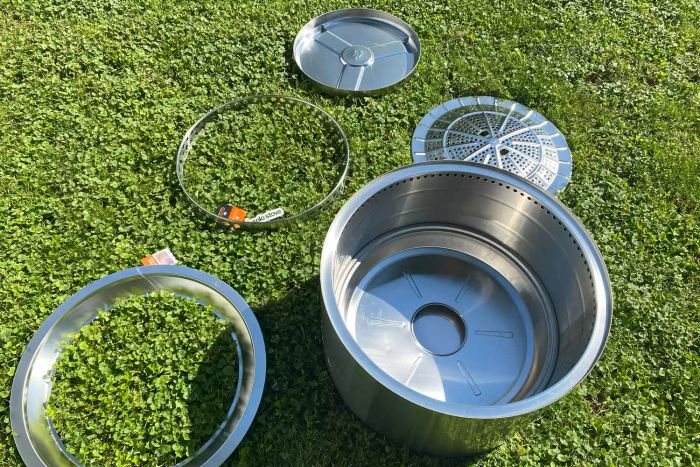 The complete Solo Stove Yukon 2.0 set displayed on a grassy area