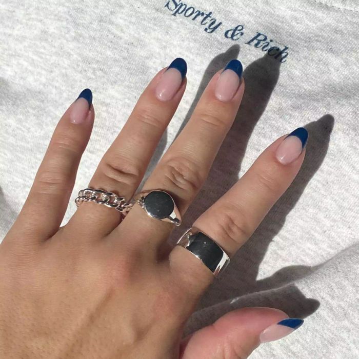 French manicure with blue tips.