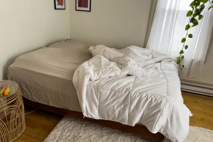 The Sijo Clima Tech TempTune Comforter elegantly displayed on a bed