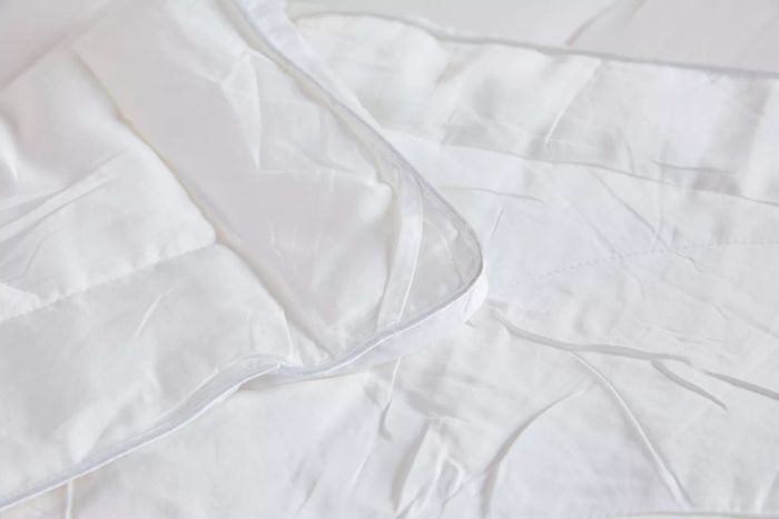 A detailed view of the edge of the Buffy Breeze Comforter