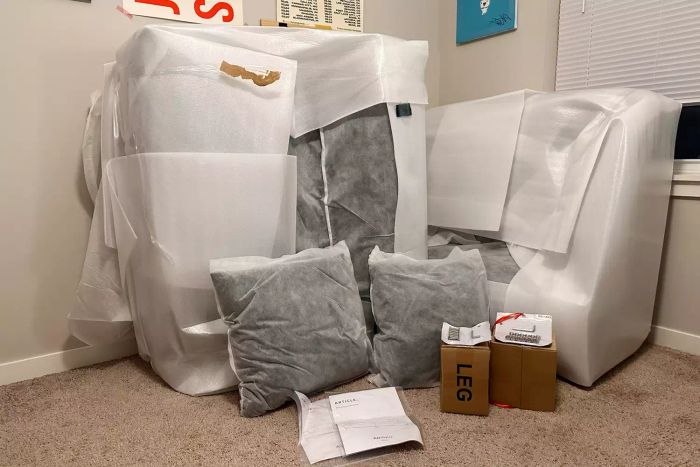 The Article Abisko Sofa components packaged and ready for assembly.