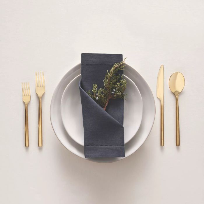 Folded napkin with herbs