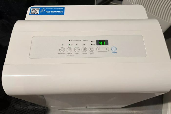 A top-down view of the Homelabs 50-Pint Wi-Fi Dehumidifier HME031003N in operation