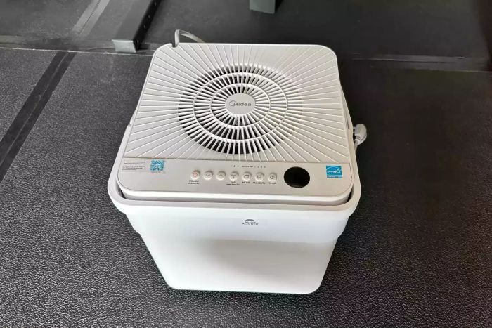 A top-down view of the Midea Dehumidifier displaying its control panel. 