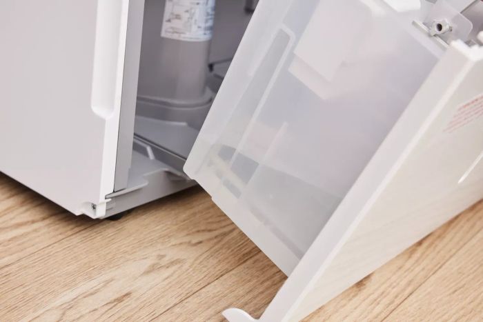 A close-up view of the water tank on the Homelabs 50-Pint Wi-Fi Dehumidifier HME031003N