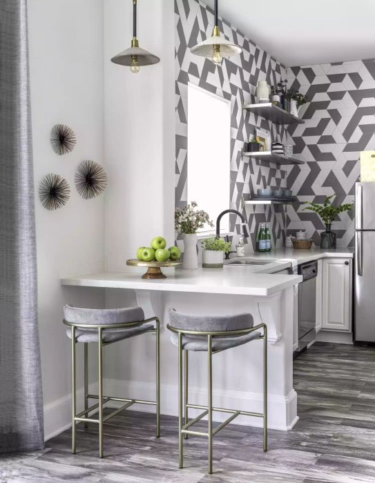 Wood tiles bring a natural beauty, offering the charm of wood flooring without the hassle of upkeep.