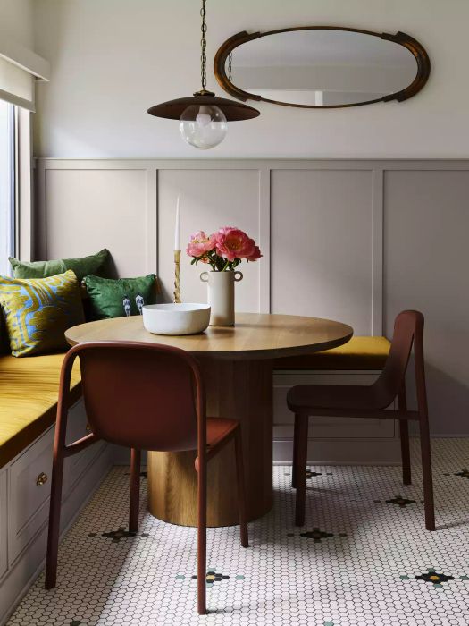 Penny tiling adds timeless charm and a playful texture, perfect for a variety of design styles.