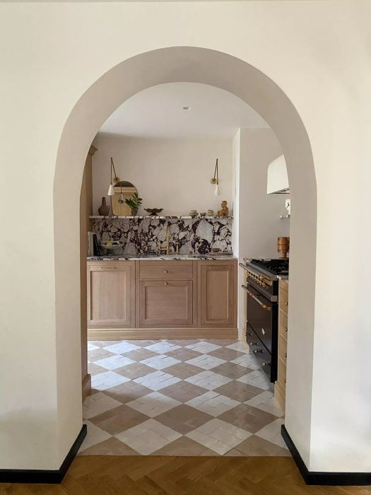 Kitchen featuring a striking diamond-patterned floor design.