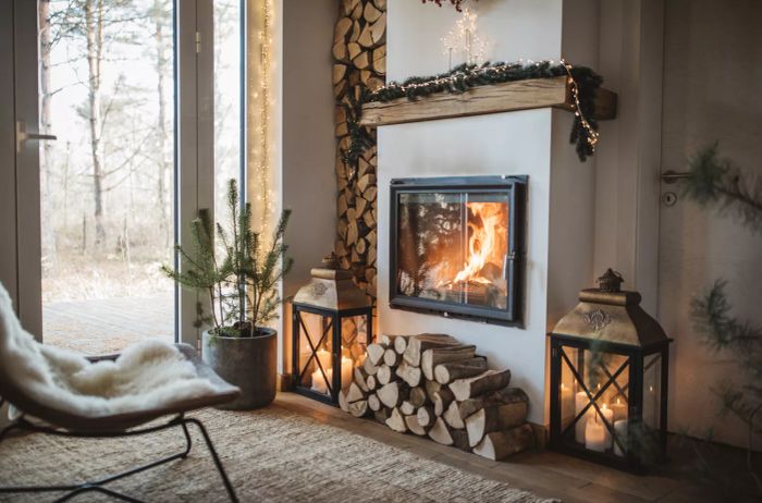 A warm and inviting winter living room featuring a cozy fireplace.