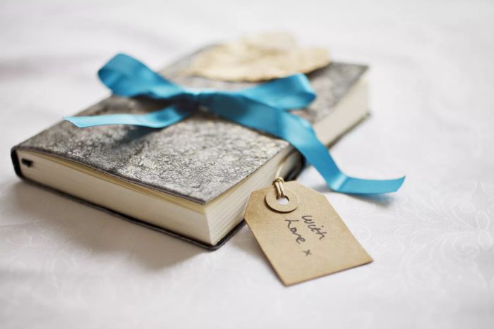 Place a cash gift inside a book