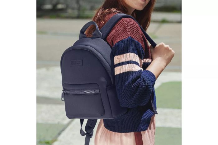 A person carrying the Dagne Dover Dakota Backpack