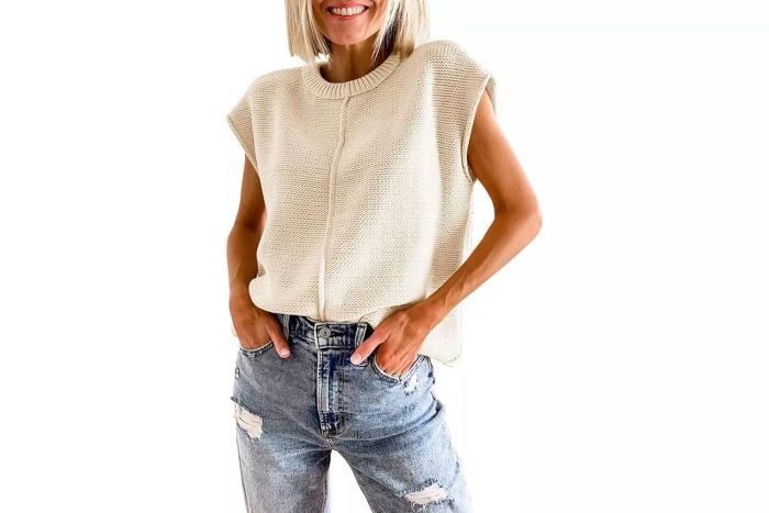 This lightweight, casual knit sweater from Saodimallsu is the perfect summer top. Featuring cap sleeves, a crew neck, and a loose, comfortable fit, it's an ideal choice for staying stylish yet comfortable in warm weather.