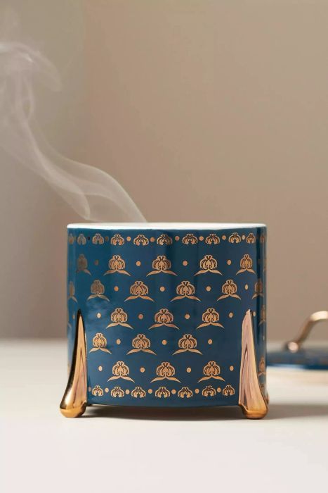 The Anthropologie ceramic candle is a luxurious way to add elegance and a touch of warmth to your home.