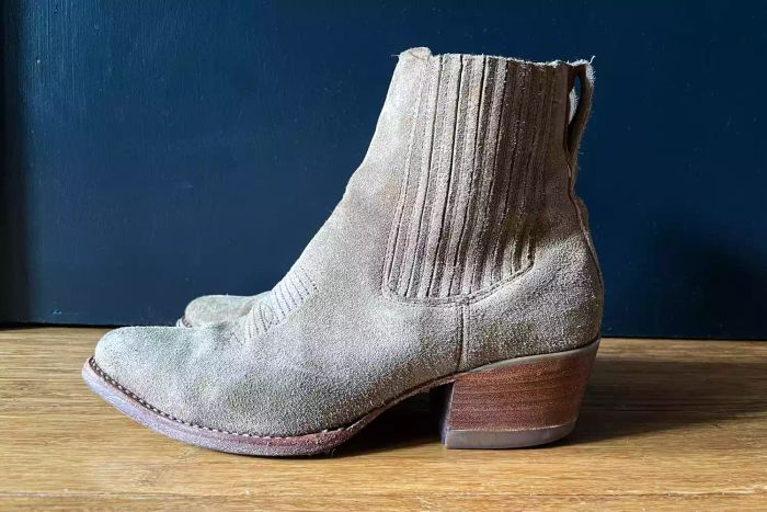 A side angle view of a pair of Tecovas The Taylor Chelsea Boots