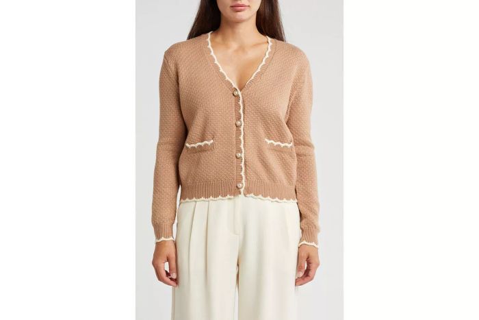 A scallop trim cardigan that elevates your layering game with its delicate details.