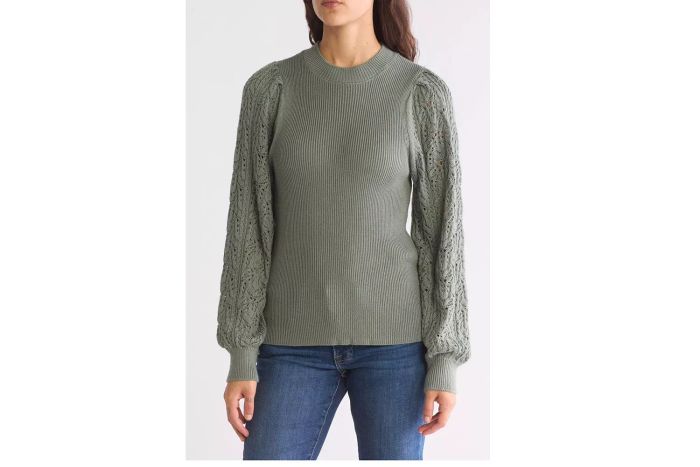 A pointelle sweater brings texture and refinement to your wardrobe.