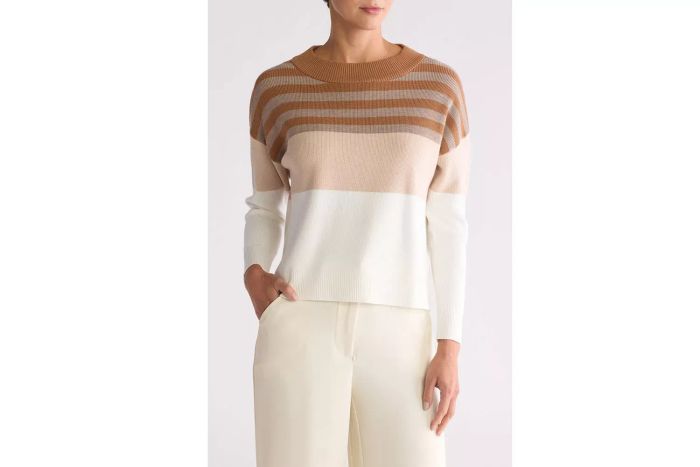 A stripe sweater is a versatile and stylish option for layering or wearing on its own.