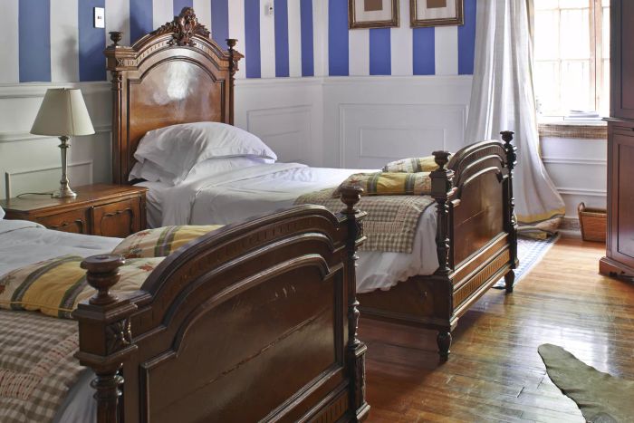 twin-sized beds in a shared bedroom