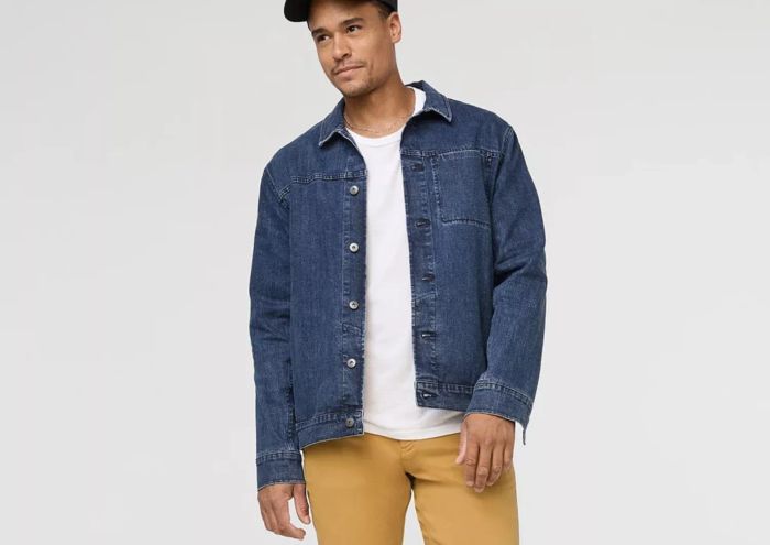 a person wearing a jean jacket
