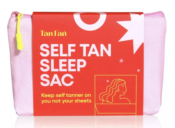 a pink and red self-tan sleep sac