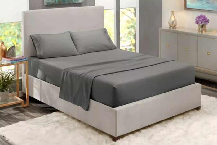 The Clara Clark Bed Sheets Set includes a 4-piece microfiber sheet set with deep pockets, designed for a queen-sized bed. It features a soft, smooth finish in a stylish gray color, part of their 1800 series collection.
