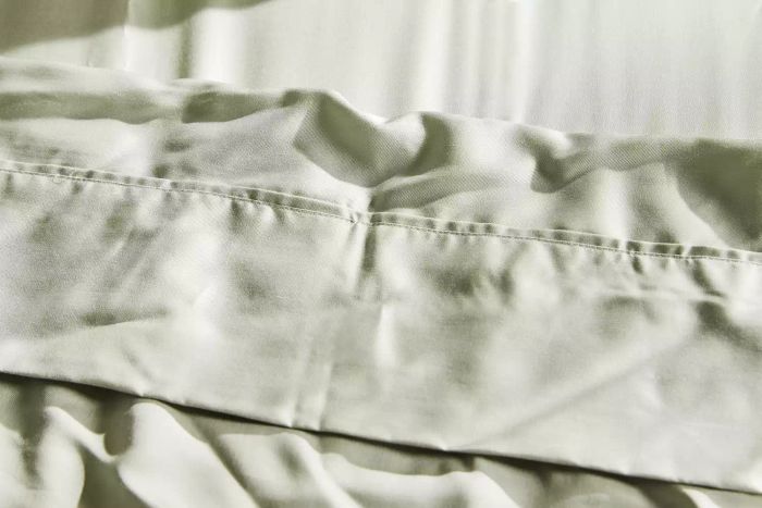 Close-up view of the Bamboo Bay 4-Piece Bamboo Sheet Set's bed cover placed on a bed.
