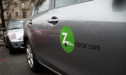 A Zipcar parked on the street