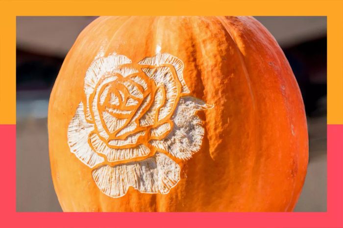 a flower design carved into a pumpkin