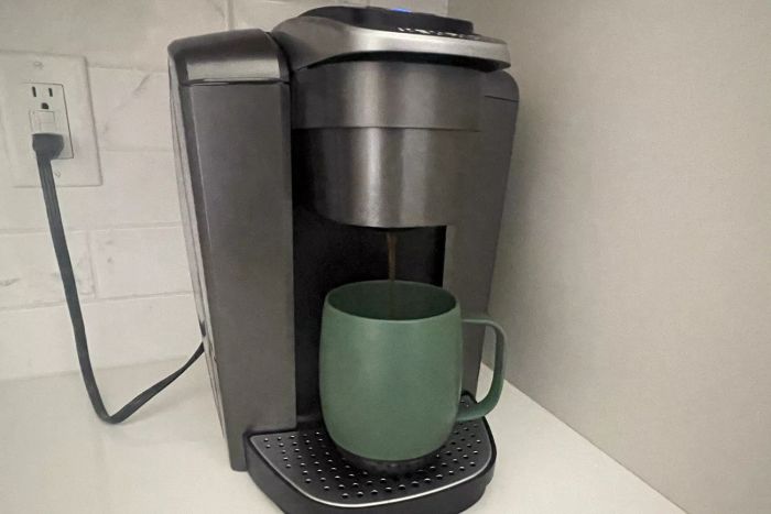 Coffee being poured into the Nextmug Temperature-Controlled Self-Heating Coffee Mug