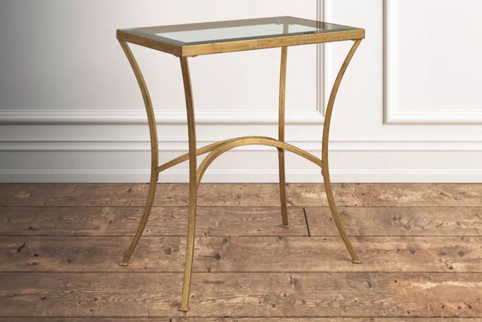 The Wayfair Kelly Clarkson Home Anya Glass Top End Table is a perfect blend of modern style and functionality for your living room.