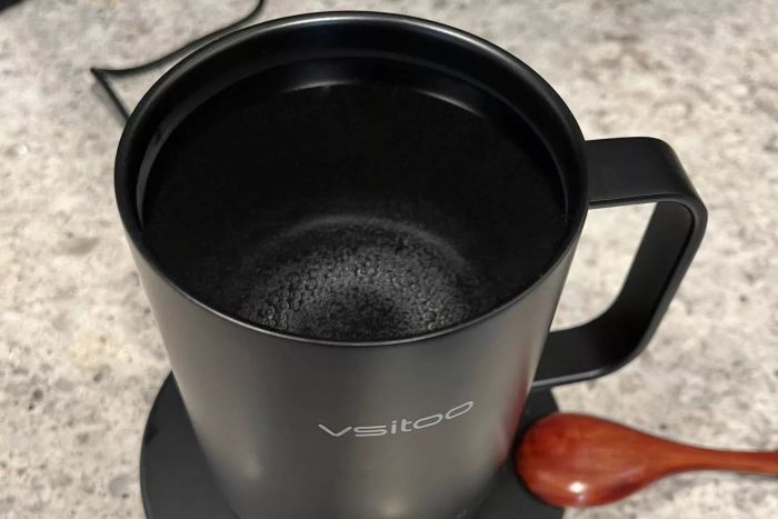 Vsitoo S3pro Temperature Control Smart Mug 2 placed on a counter