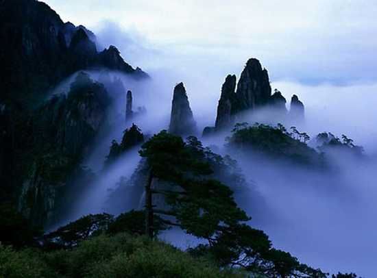 Sanqingshan, also known as Mount Sanqing, is a famous mountain in Jiangxi Province, China. Renowned for its awe-inspiring granite peaks and Taoist cultural significance, Sanqingshan is part of the 'Sanqingshan National Park'. It is recognized for its spectacular scenery, with breathtaking views of the misty mountain tops and sharp, jagged granite spires. The mountain holds a sacred place in Taoist philosophy, with numerous ancient temples and shrines dotting the landscape. Sanqingshan is also a UNESCO World Heritage Site and continues to be a favorite location for travelers seeking a blend of natural beauty and spiritual enlightenment.