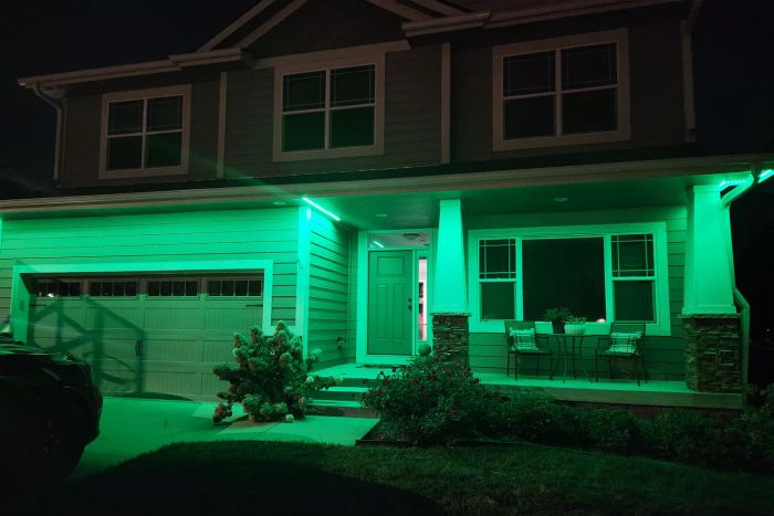 The Govee WiFi Outdoor LED Strip Lights emit a vibrant green glow.