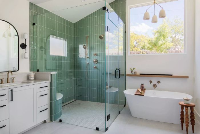 A modern bathroom featuring a sleek walk-in shower design.