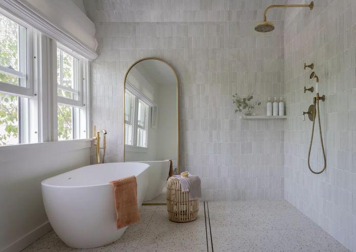 A wet room design in a bathroom.