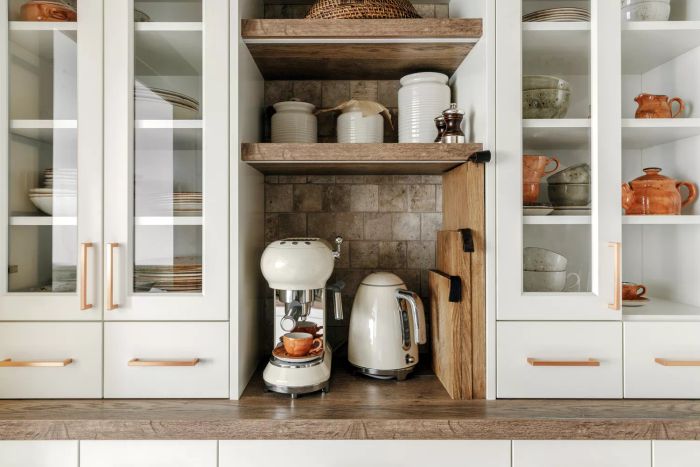 Contemporary Japandi kitchen design featuring an apartment with earthy tones, natural textures, solid oak furniture, and traditional Japanese sliding wood doors. Embracing the Japandi aesthetic.