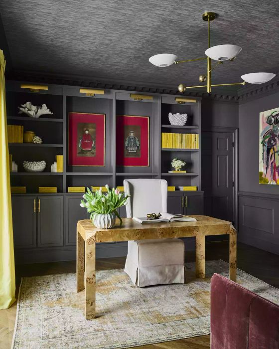 art displayed on a bookshelf