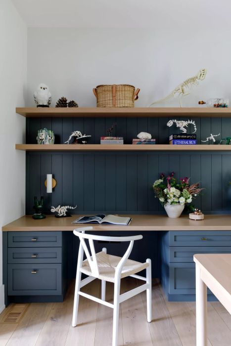 bookshelf above the desk