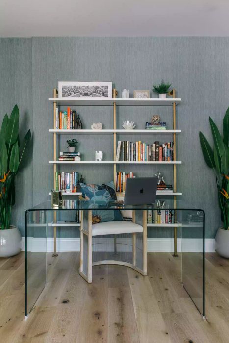bookshelf with an eclectic, library-inspired arrangement