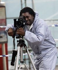A professional in forensic photography.