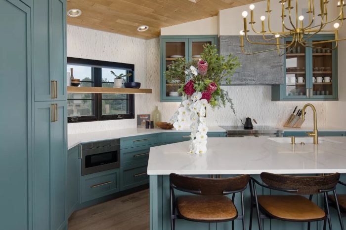 The kitchen painted in blue tones