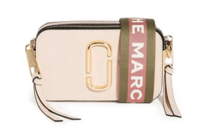 The Marc Jacobs Snapshot Bag is a trendy, multifunctional accessory perfect for any wardrobe.