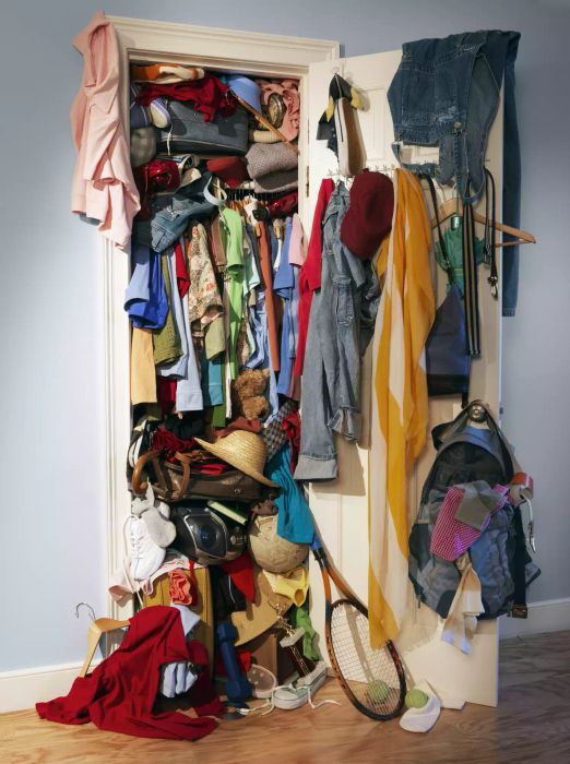 A disorganized and messy closet