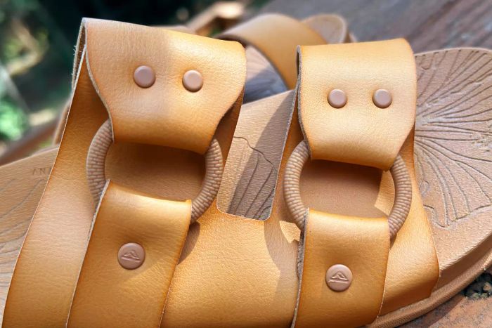 A detailed close-up of the buckles on the Reef Cushion Vera Cruz Slide.