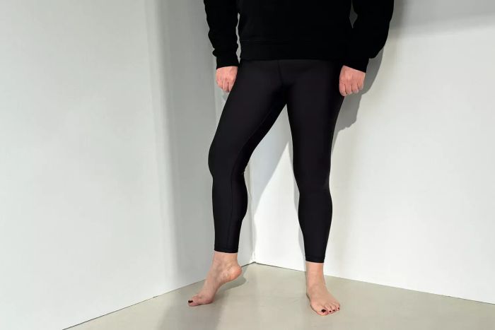 An individual models the Athleta Interval Tight