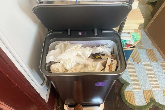 Waste placed inside the simplehuman 12 Gallon Rectangular Hands-Free Kitchen Step Trash Can