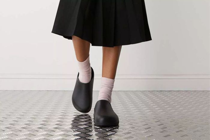 A person wearing Crocs Dylan Clog