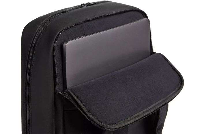 A close-up of the Monos Metro Backpack holding a laptop.