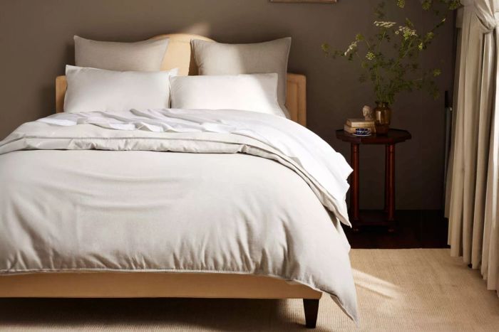 A bed transformed with the Brooklinen Heathered Cashmere Core Sheet Set.