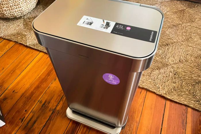 The top view of the simplehuman 12 Gallon Rectangular Hands-Free Kitchen Step Trash Can, displaying the attached stickers